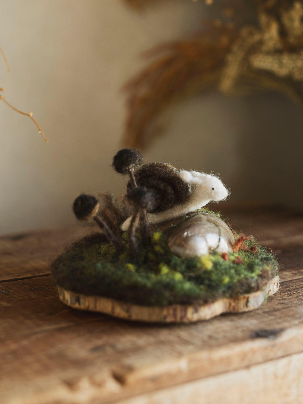 Hand Felted Snail and Stone on Wood Round, CO182
